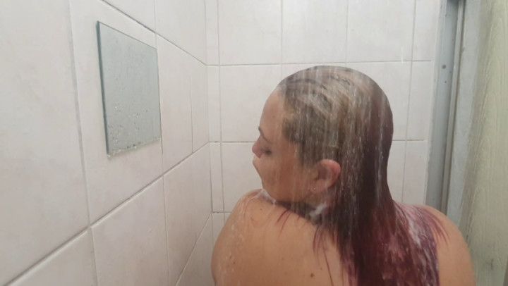 Close up hair washing in the shower POV