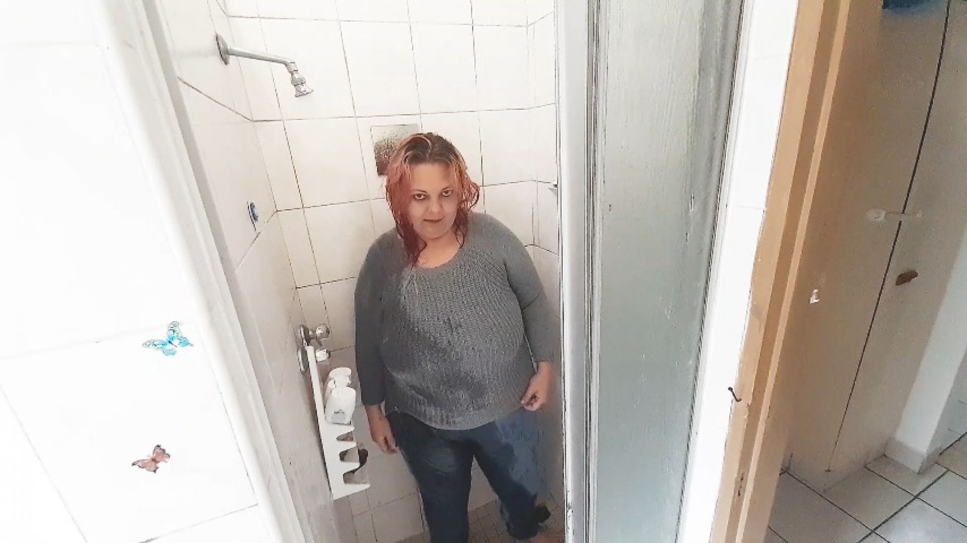 Jeans and sweater wetlook in the shower