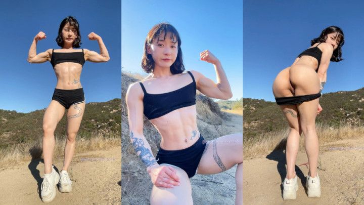 Cute petite Asian muscle girl flexes and flashes in nature