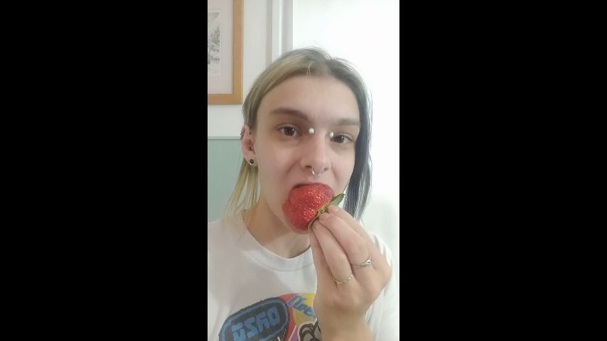 Eating a giant strawberry