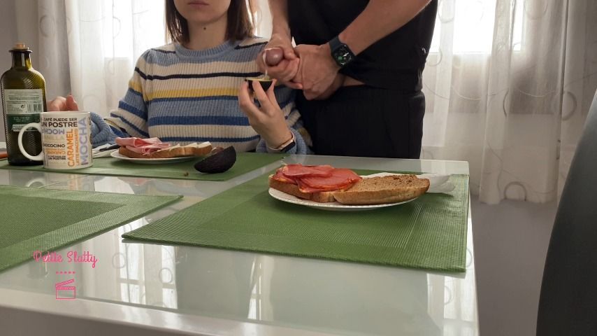 Young girl loves milked avocado