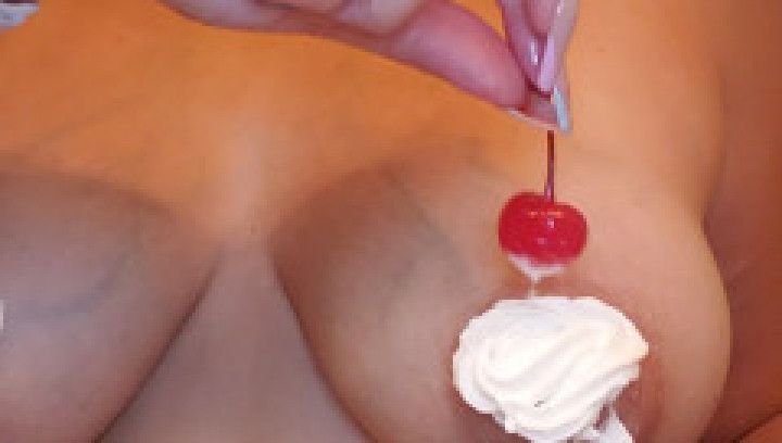 Whipped cream and cherries