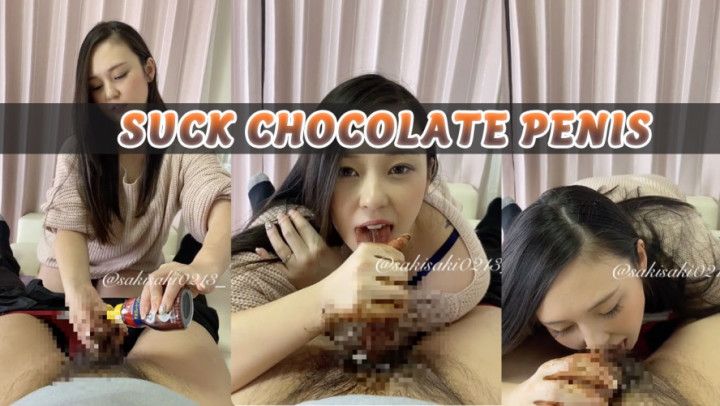 Asian wife sucks chocolate penis