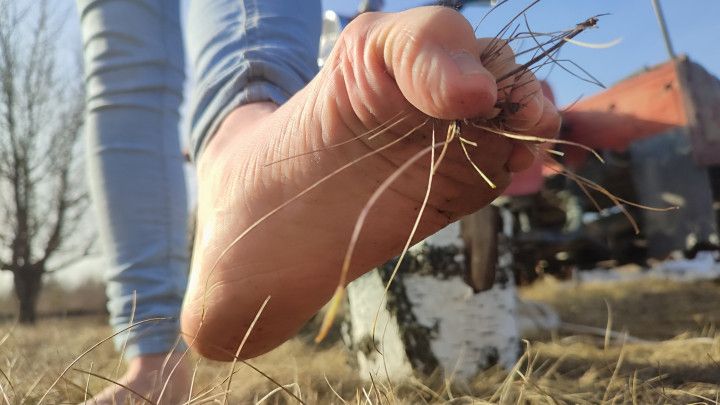 I walk barefoot on the grass