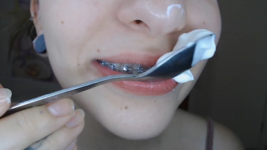 Little braces mouth eats yogurt