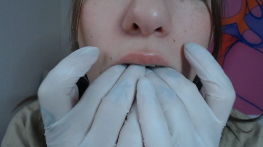 white gloves and lot of saliva on braces