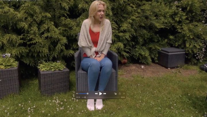 Aston Wilde wets her jeans in the garden