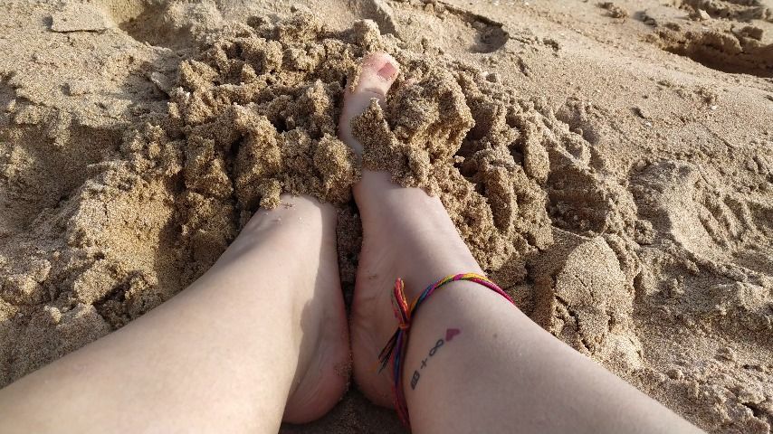 feet on the beach