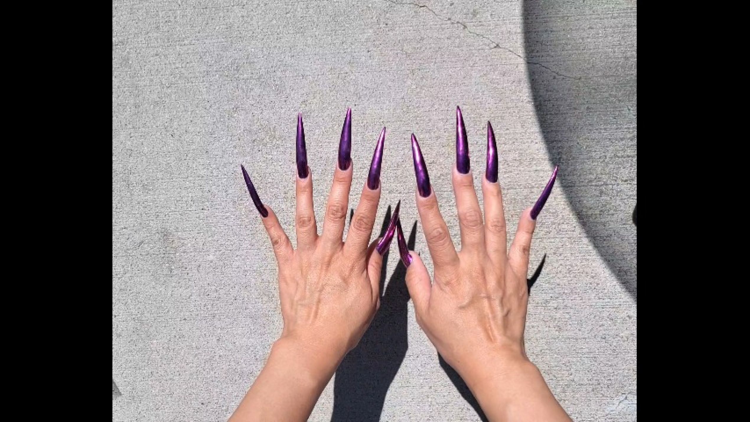 Long SHARP XL-Stiletto  Purple) Nails Tapping on concrete