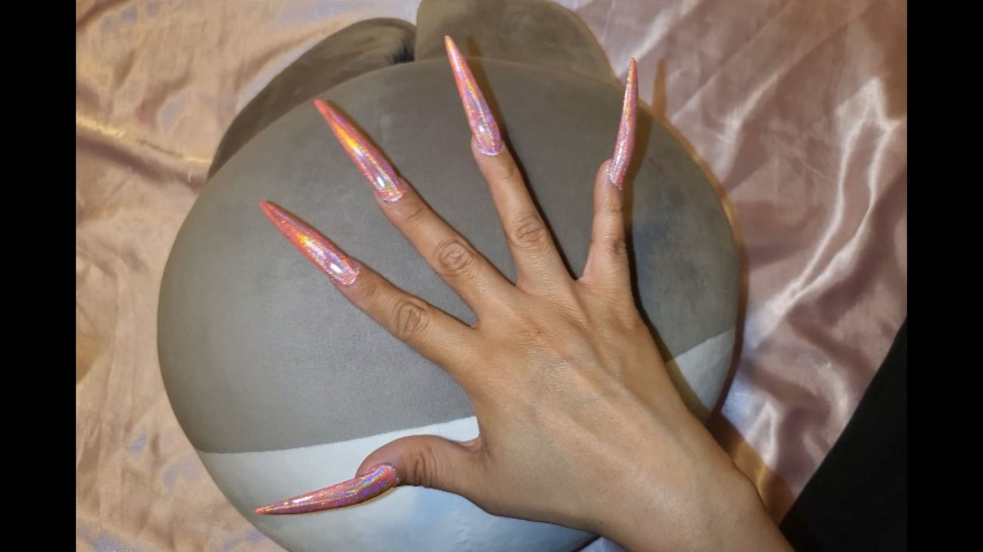 XL Long Pink) Nails scratching a fluffy pillow