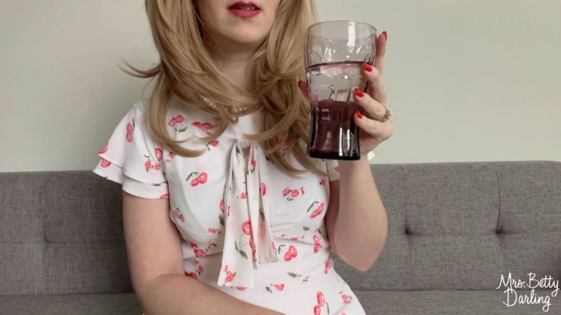 Housewife Consumes a Glass of Water