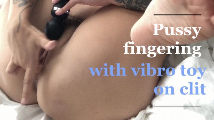 Pussy fingering with vibro toy on clit