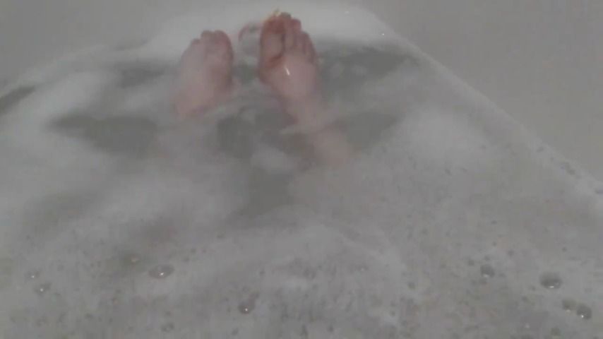 Washing my feet in the bath