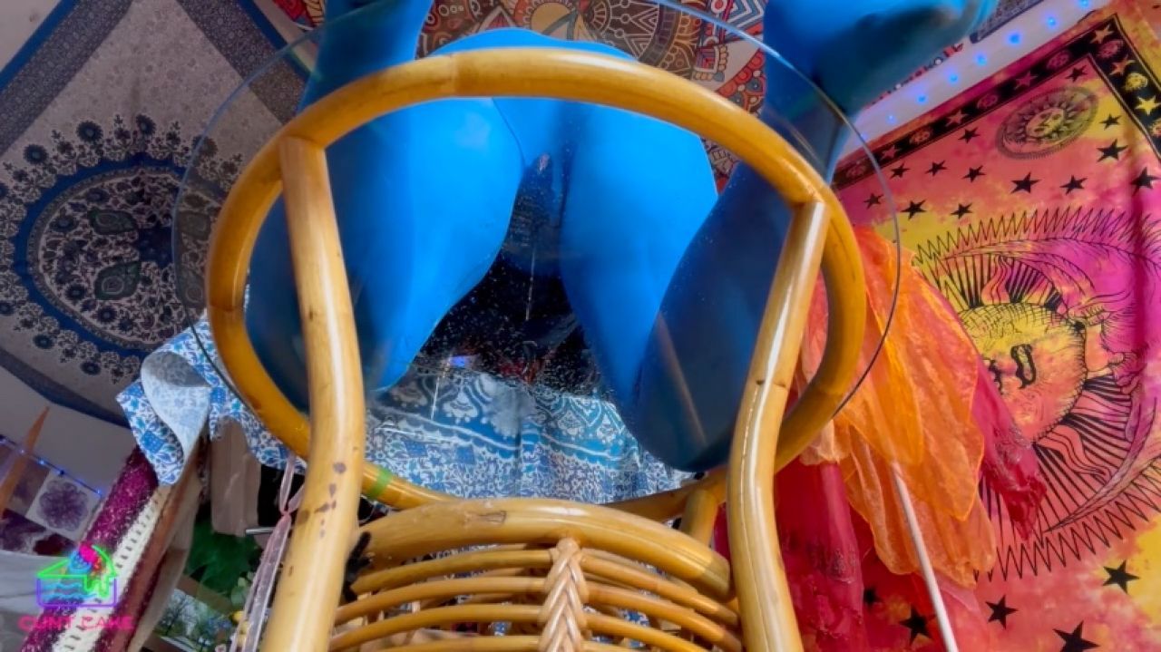 Soaking Blue Pantyhose on a Glass Table