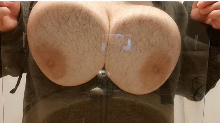 Trans male squashes tits against glass
