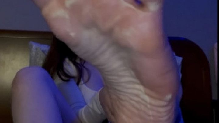 Rubbing lotion on my long, perfect soles