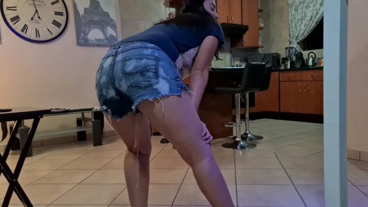 Chubby brunette jean shorts pissing