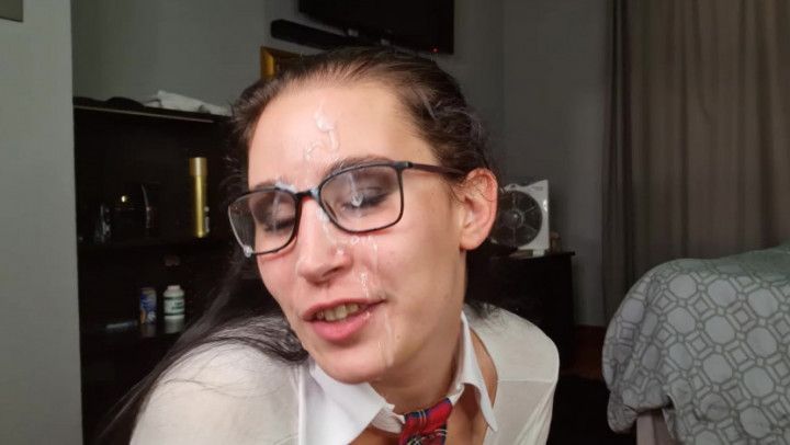 Nerdy girl with glasses sucking, facial