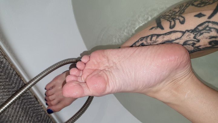 Wet Feet In Bathroom. Blue Pedicure