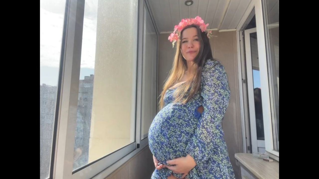 Pregnant in a dress