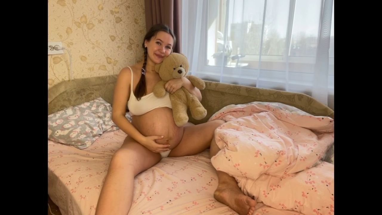 Pregnant cutie with toy