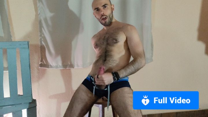 Hairy Model wearing a Speedo Jerking Off