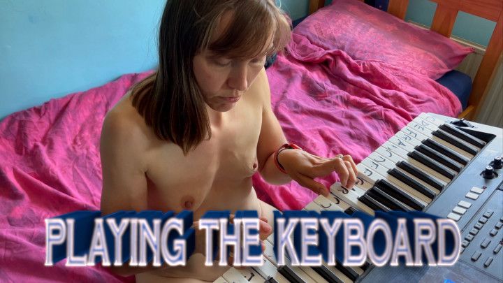 Naked, playing the keyboard, terribly