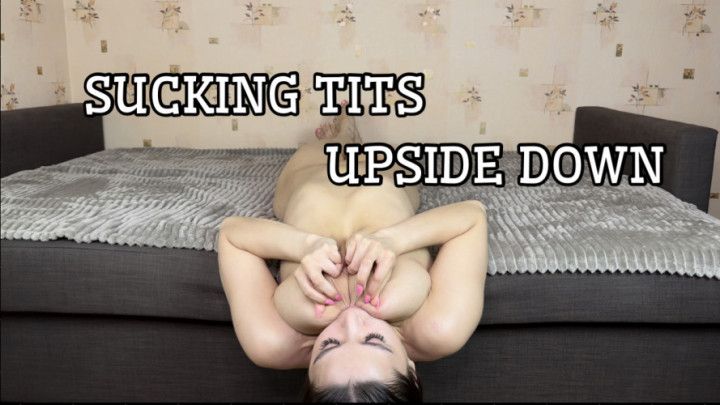 Sucking Tits Upside Down
