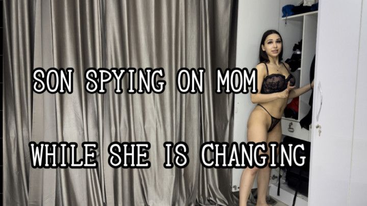 Son spying on mom while she is changing