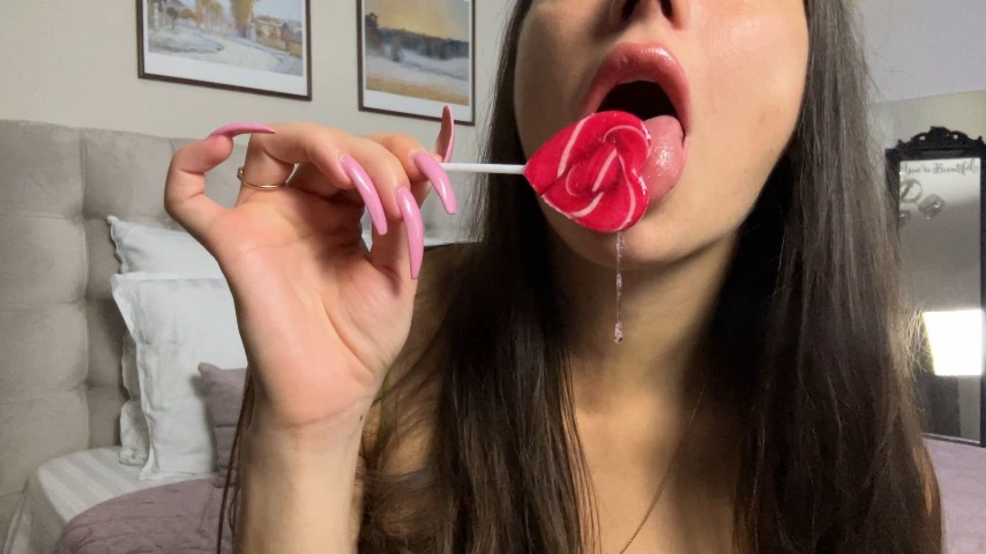 Licking a lollipop