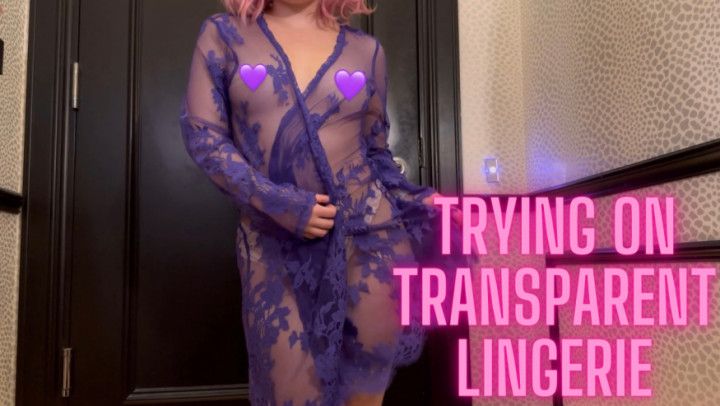Asian girl tries on transparent lingerie