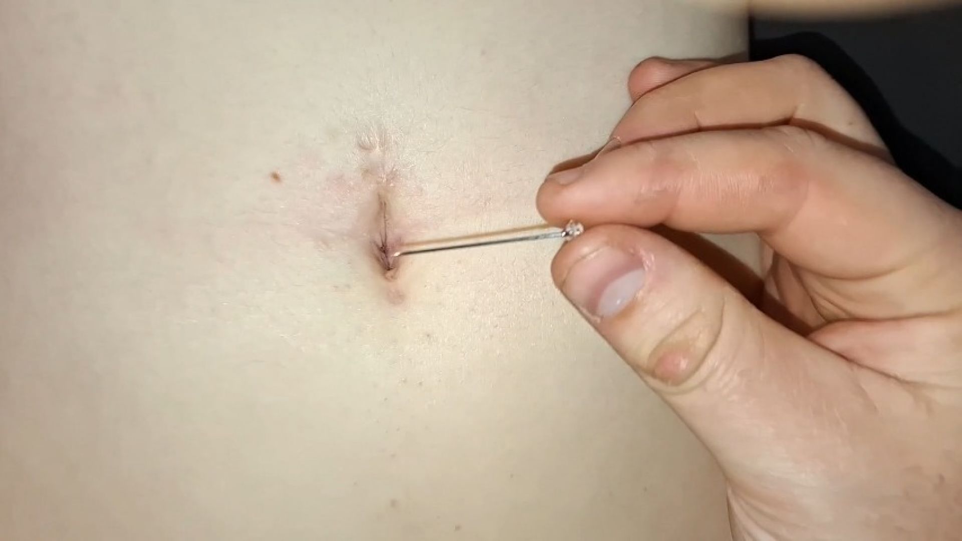 Clear gem pin in my belly button