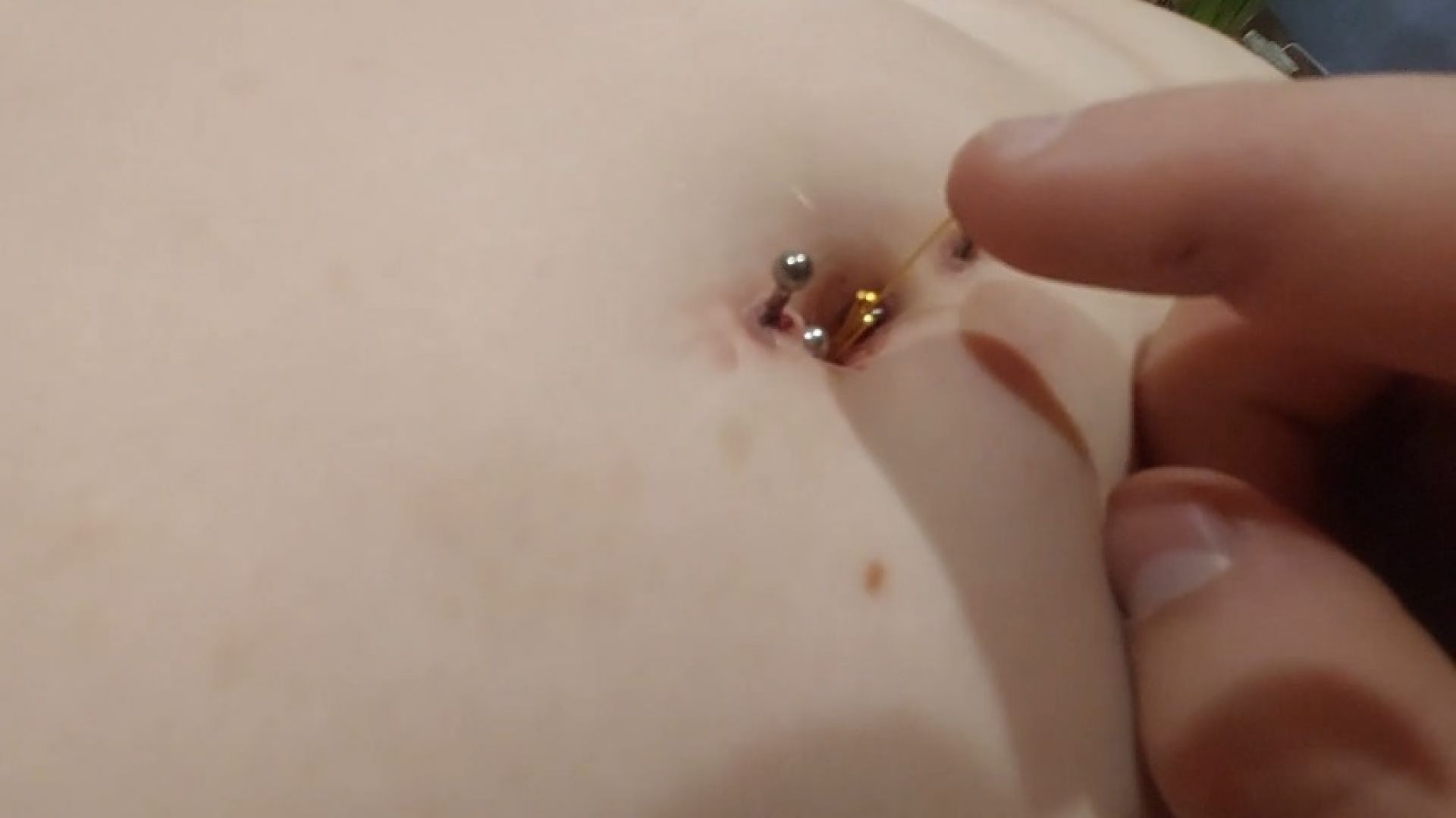 6 dress pins in my belly button