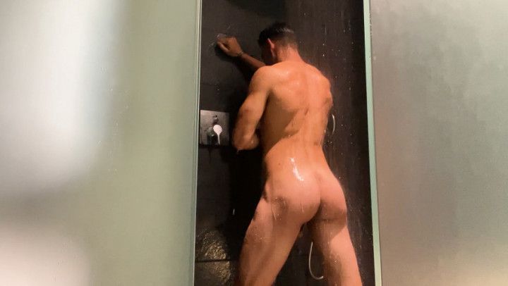 Latin wet hunk jerking off on the shower