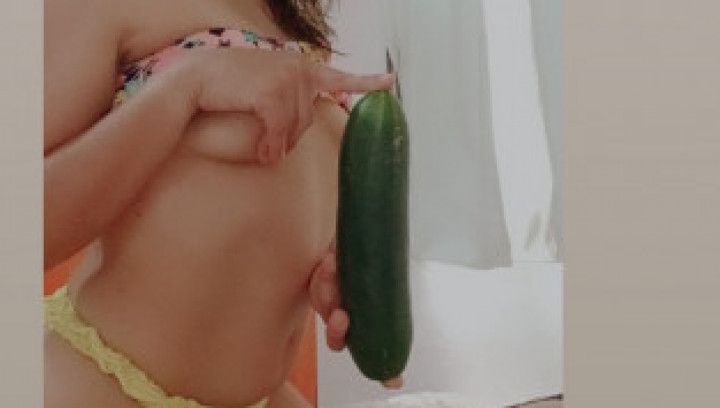 playing with a 24 cm cucumber