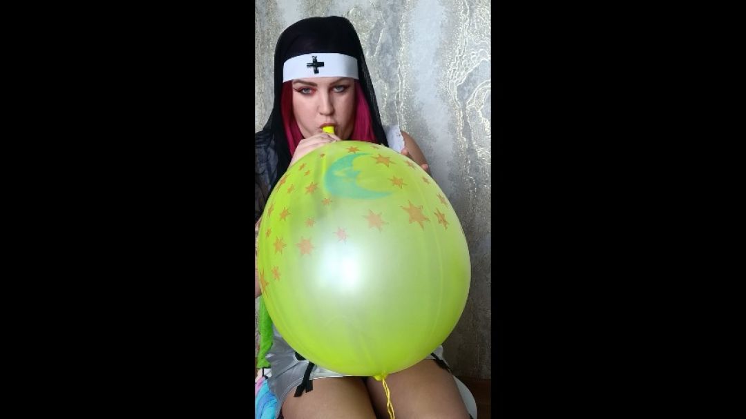 Sexy nun blowing punchballoons