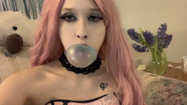 Cute teen blows bubbles