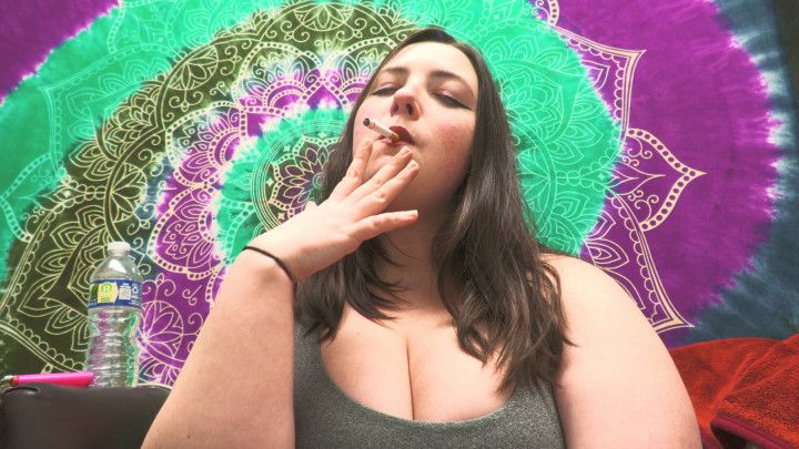 BBW smokes cigarette up close