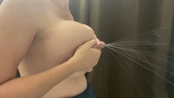 Sucking and spraying breastmilk