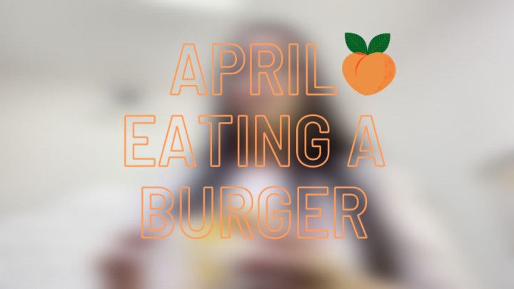 April eating a burger