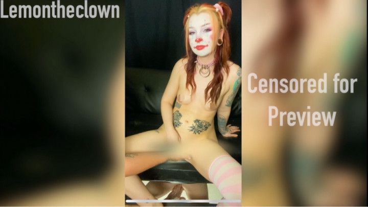 Clown girl gushes onto mirror