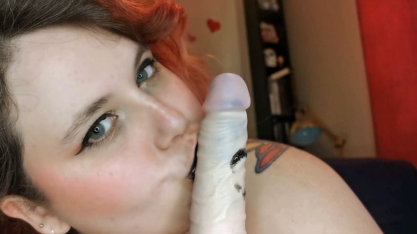 Covering your cock with black lipstick kisses