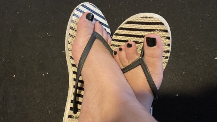 Black nails and flip flops