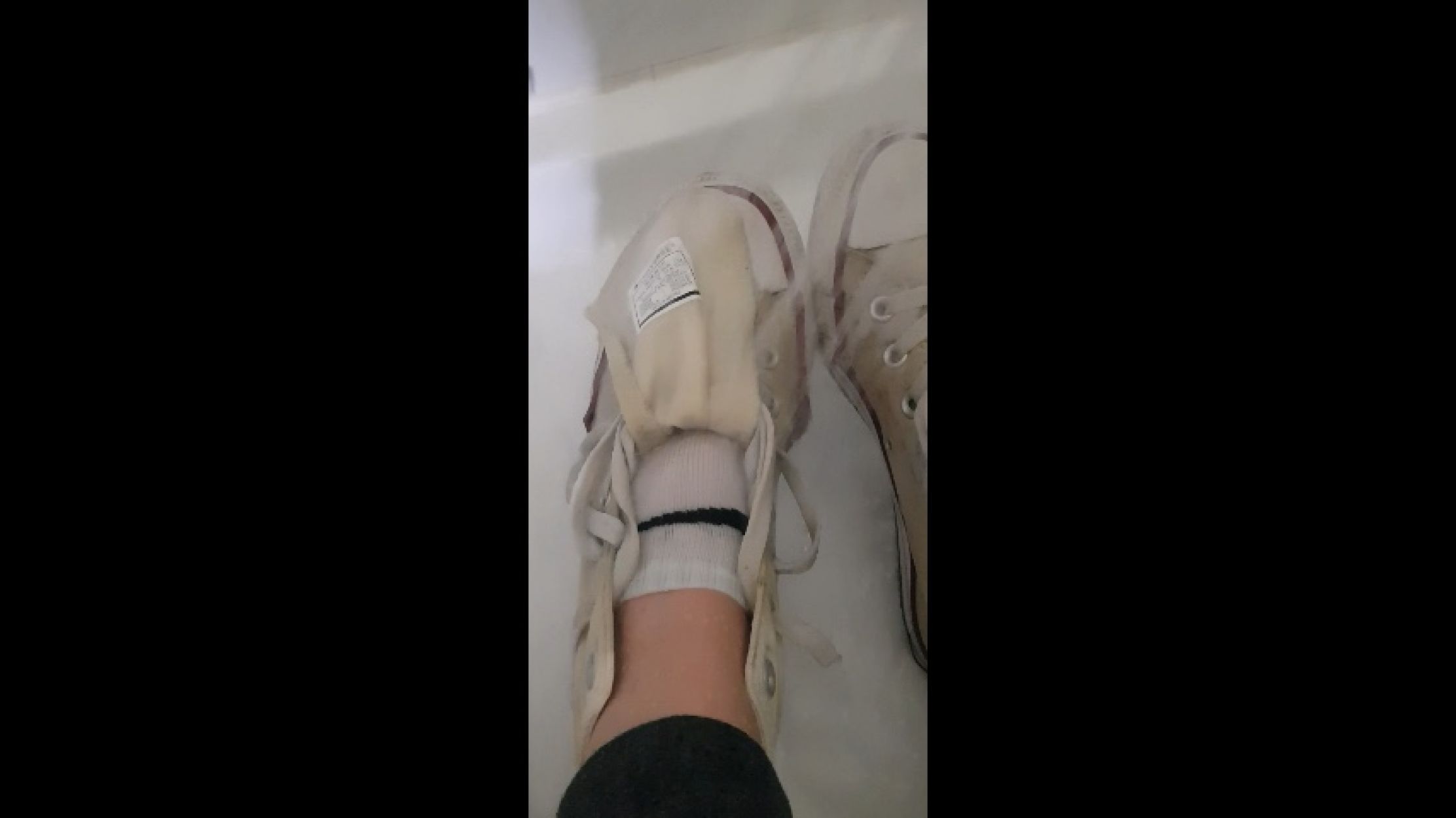 Showering with Converse + white socks