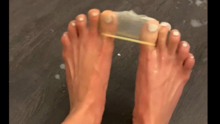 PLAYING WITH A WET CONDOM WITH MY FEET