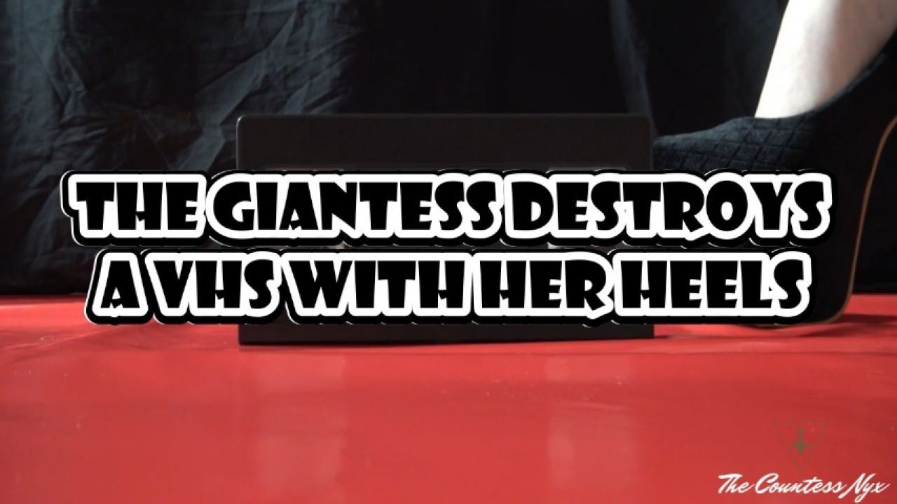 THE GIANTESS DESTROYS A VHS WITH HER HEELS