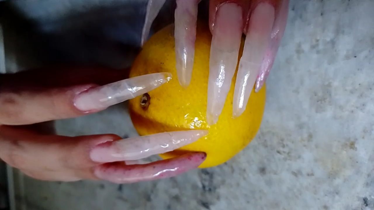 pricked orange natural nails