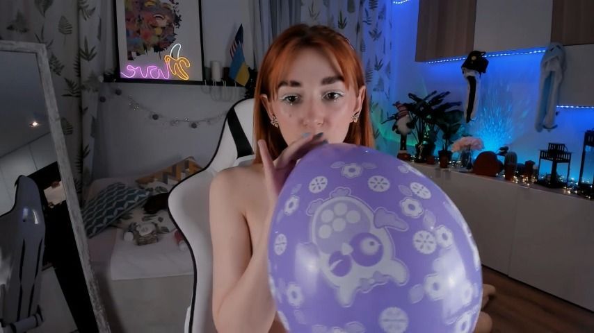 Blowing pink Balloon