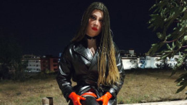 Tania walking outdoor in latex