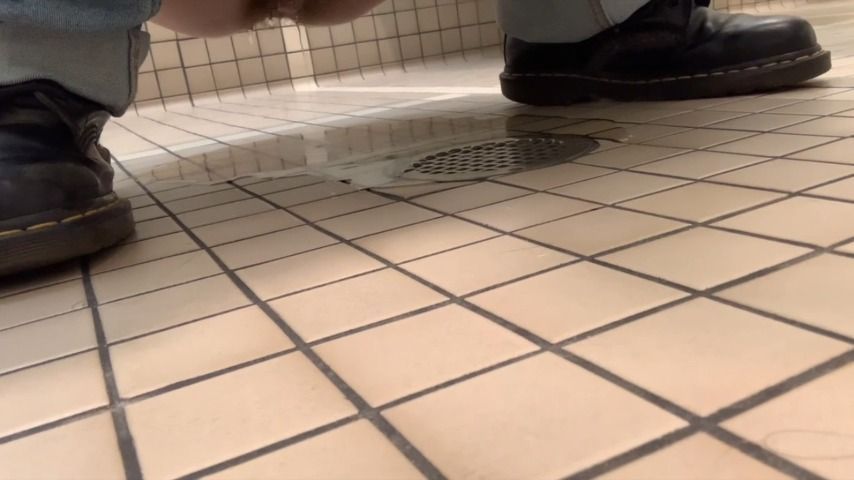 Pissing on the floor of the Men's room